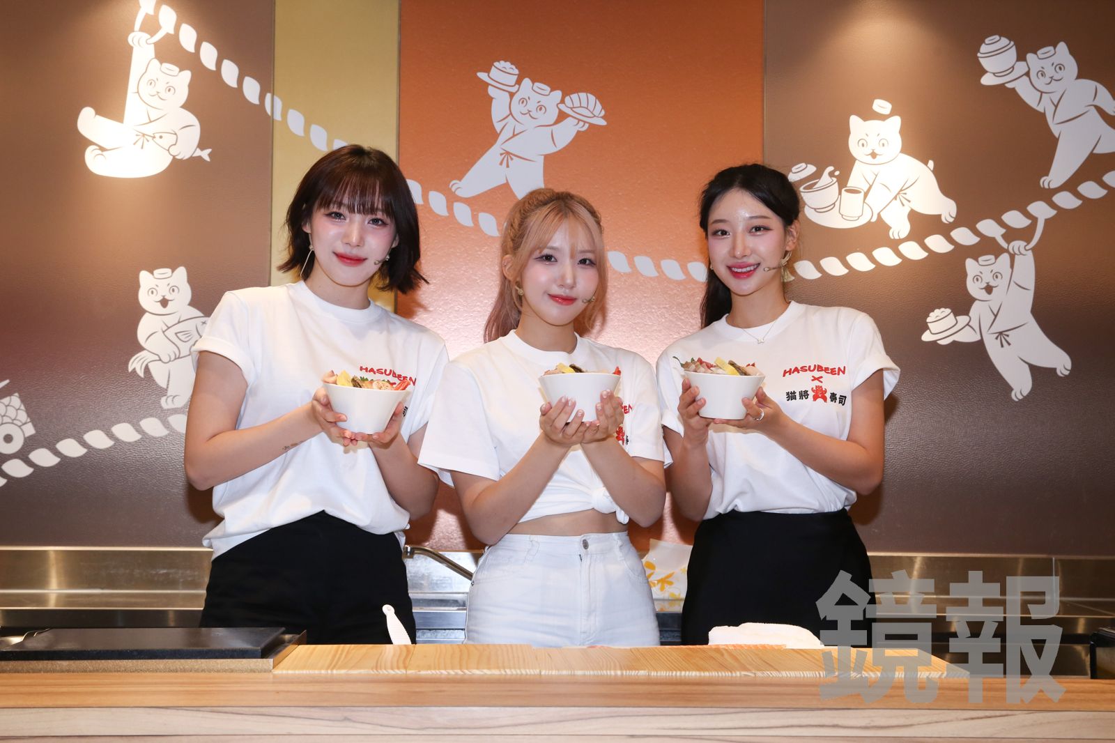 三人現場做生魚片丼飯。董孟航攝