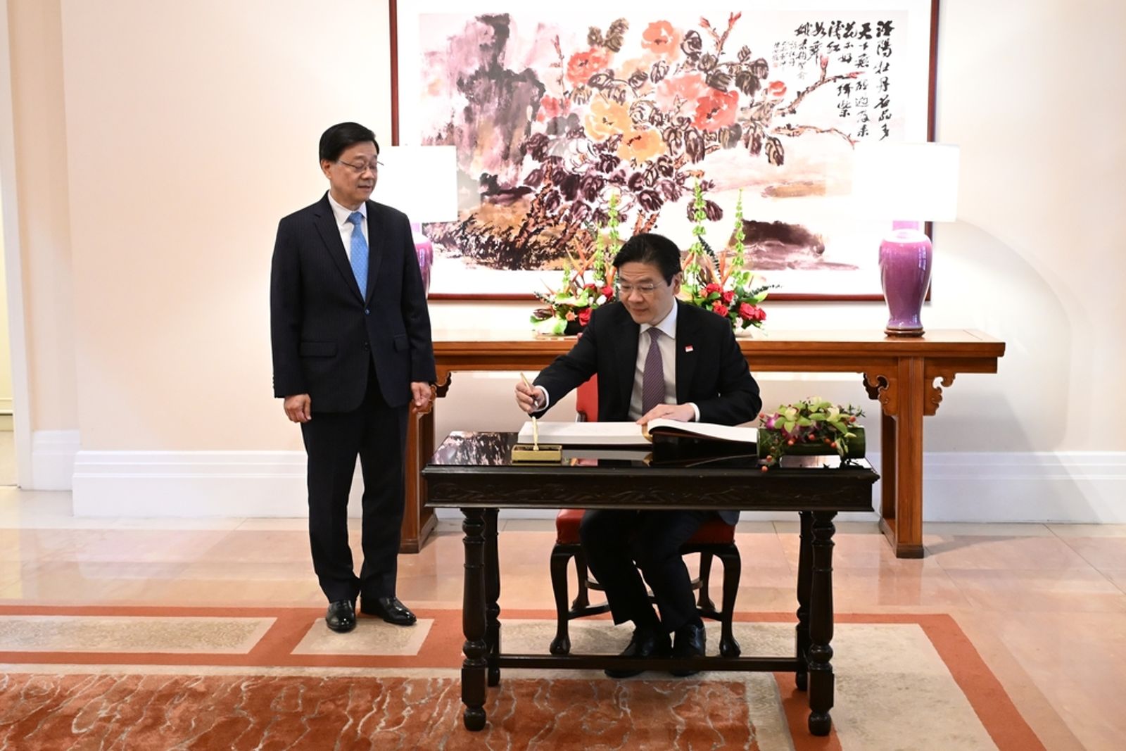 黃循財（右一）於2026年博鰲之行不回去祭祖，釋放出清晰的政策訊號。東方IC