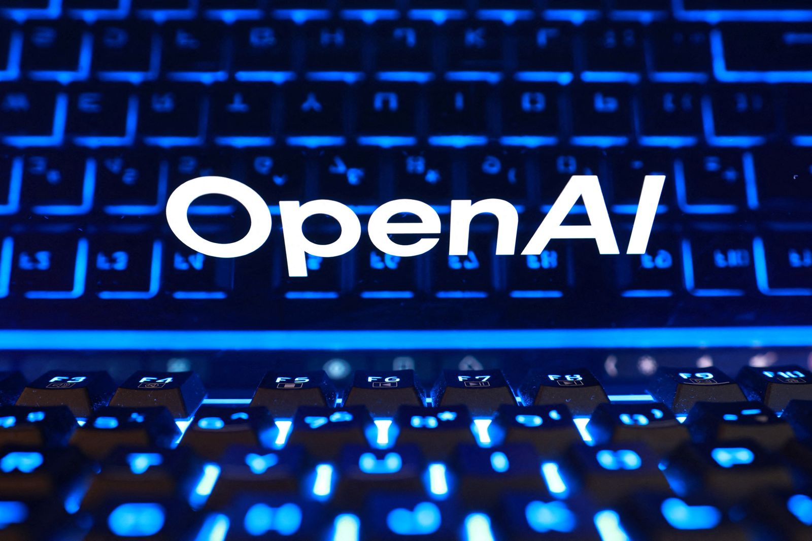 Illustration shows OpenAI logo and keyboard。圖/達志影像
