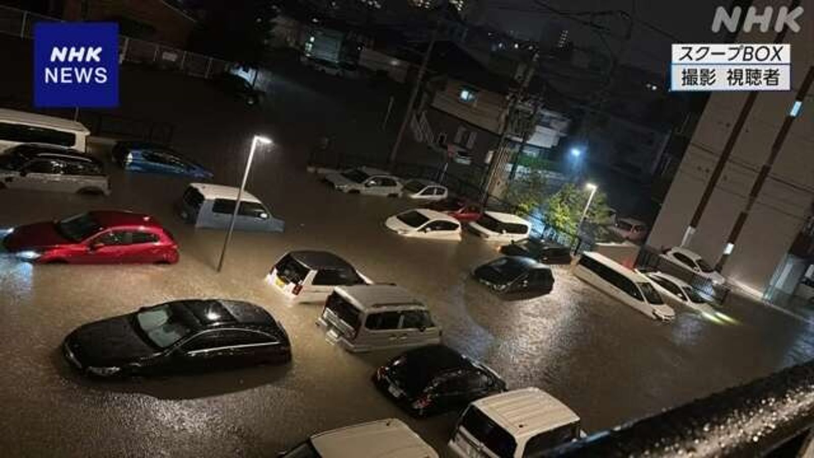 熊本市中心停車場,變泡水車場。圖/翻自NHK畫面