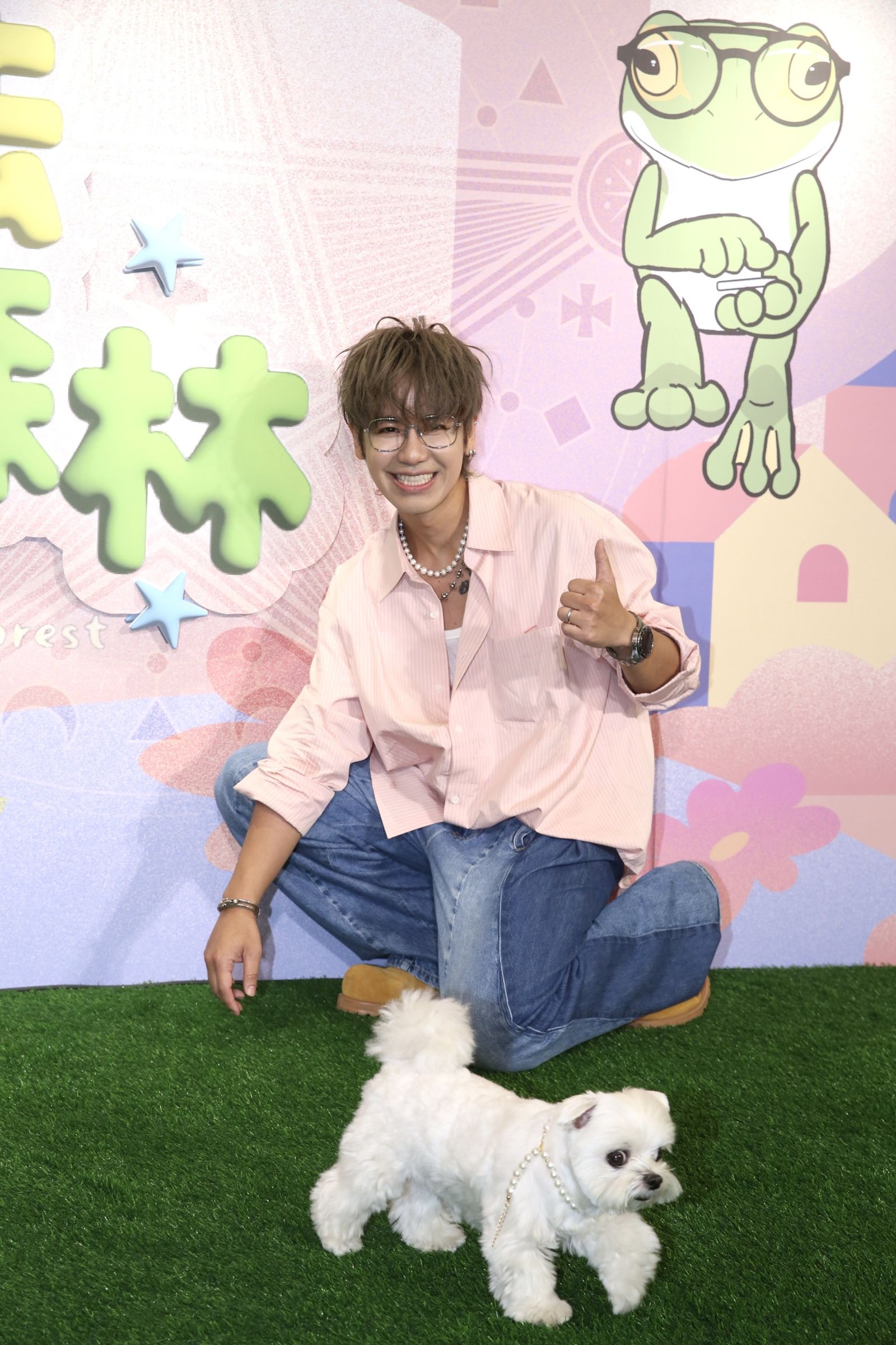 鼓鼓11日帶著愛犬一同出席活動。董孟航攝
