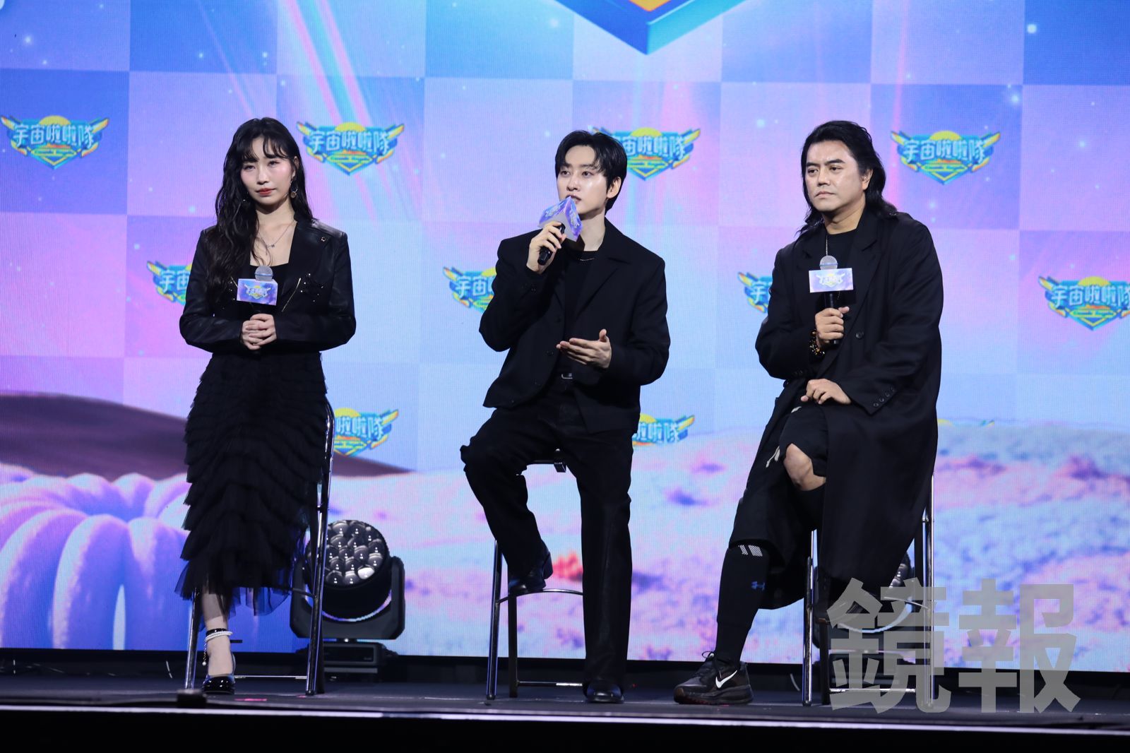 三人在台上受訪。林煒凱攝