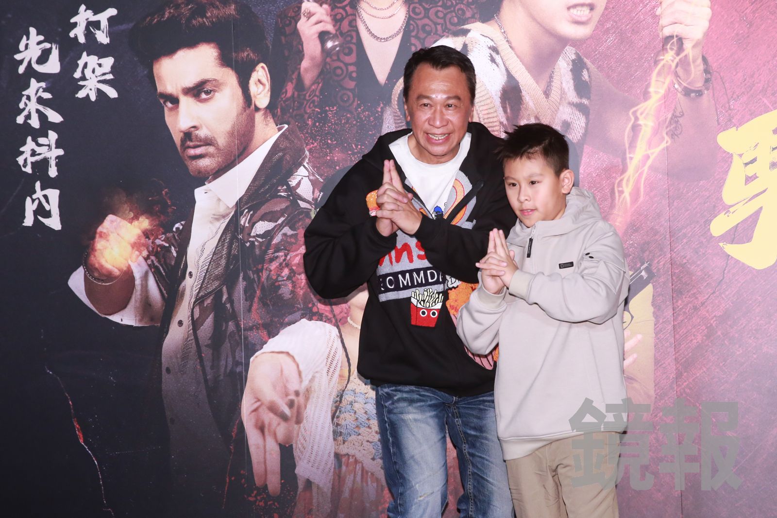 游安順(左)帶兒子游禮出席《叫我驅魔男神》首映。李鍾泉攝