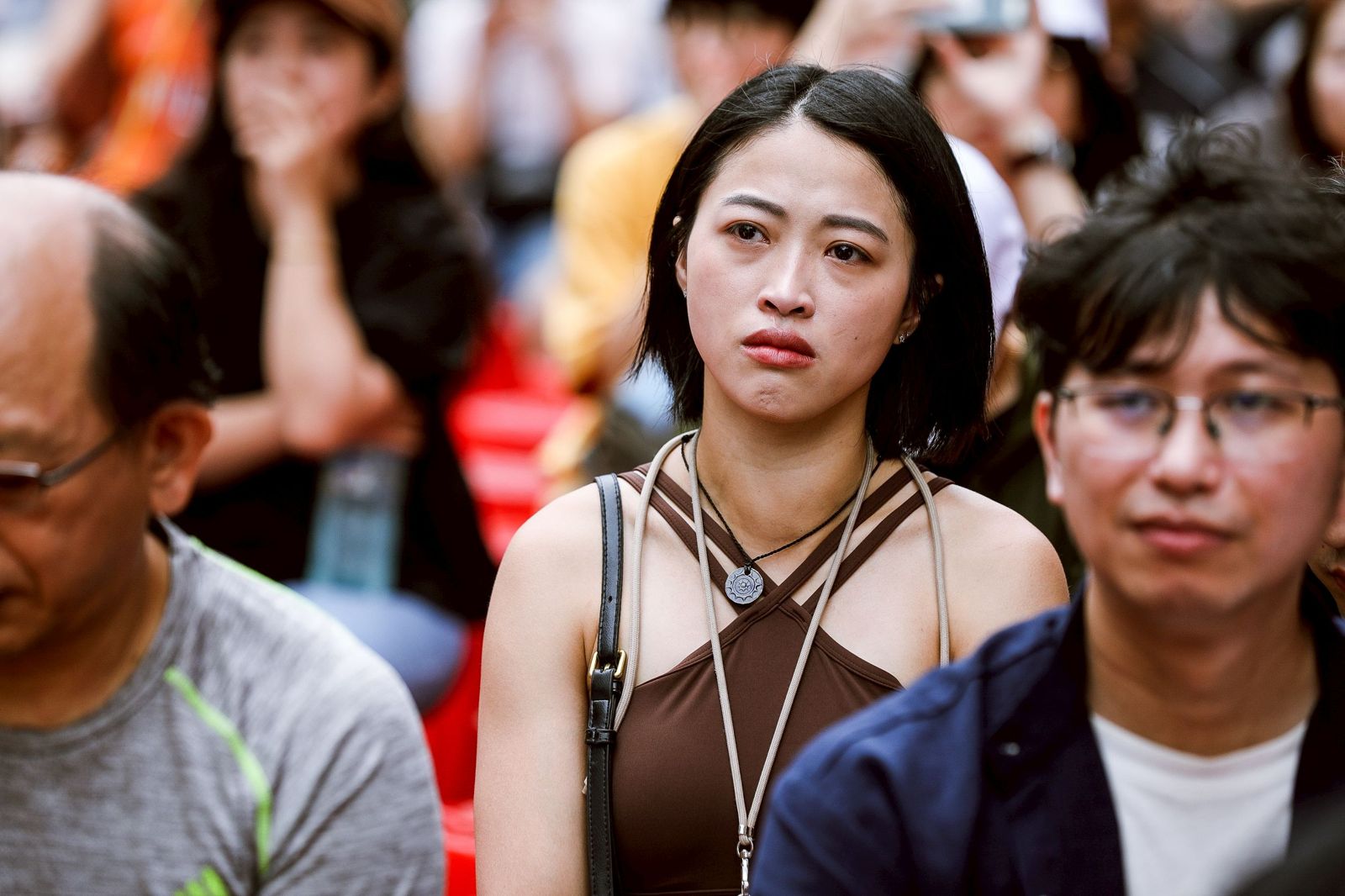大罷免結果出爐後,許多支持罷免的民眾難掩失望的表情。鄒保祥攝