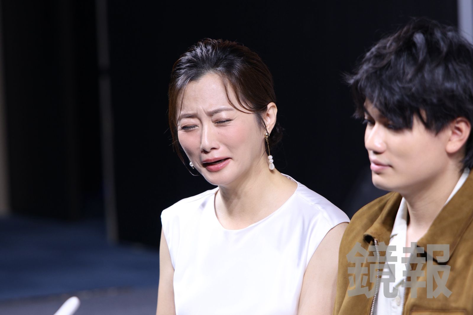 趙小僑模仿女兒哭的模樣。劉耀勻攝