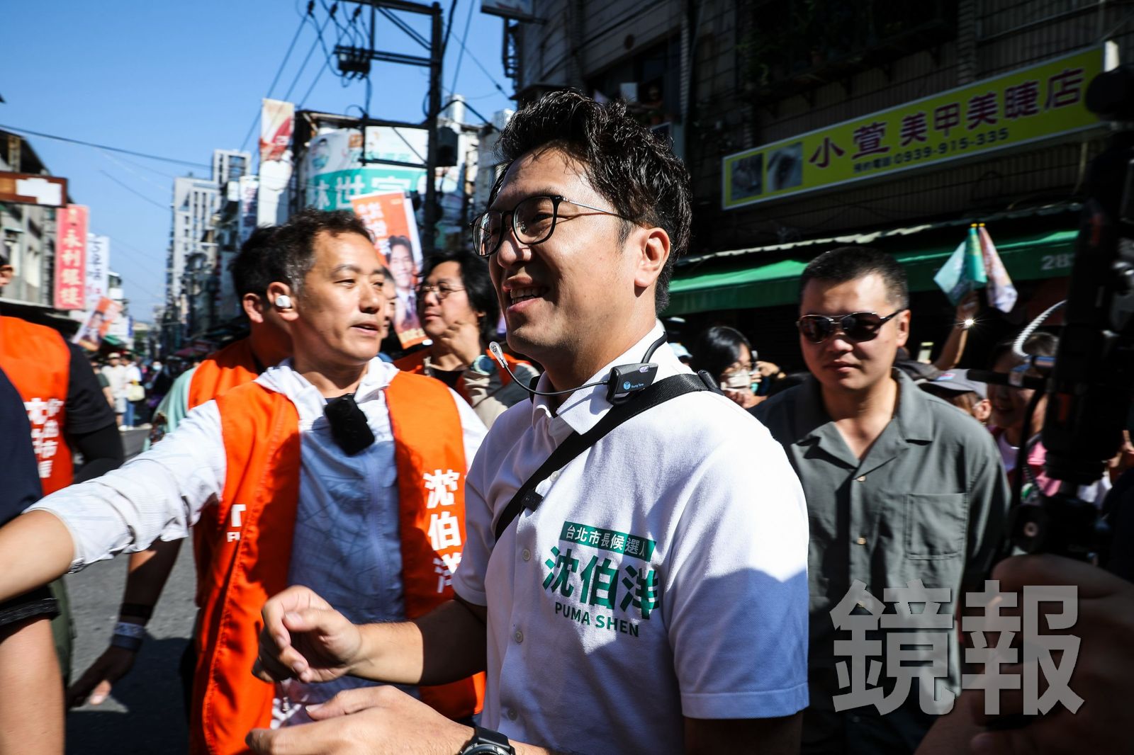 民進黨台北市長參選人沈伯洋今天上午到北投區自強市場掃街。攝影鄒保祥