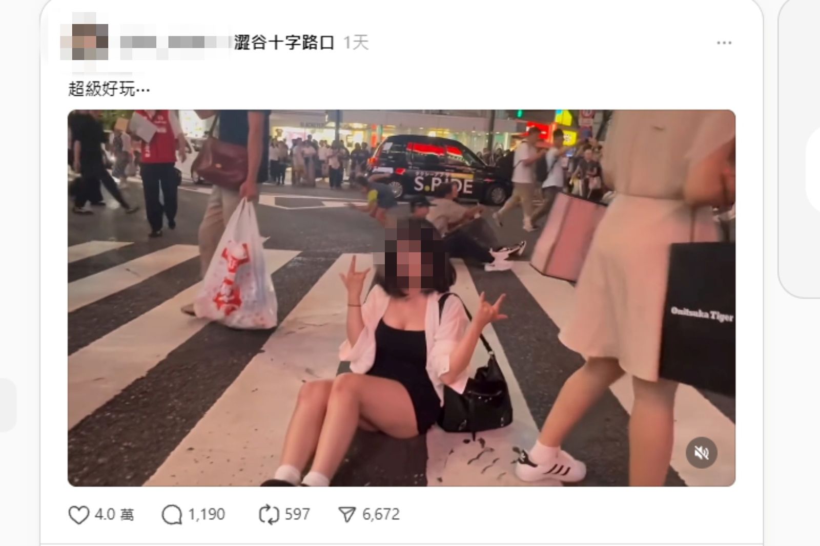 妹子坐在澀谷街頭斑馬線擺拍。圖/Threads